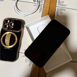 Elegant Black Smartphone with Gold Ring Case